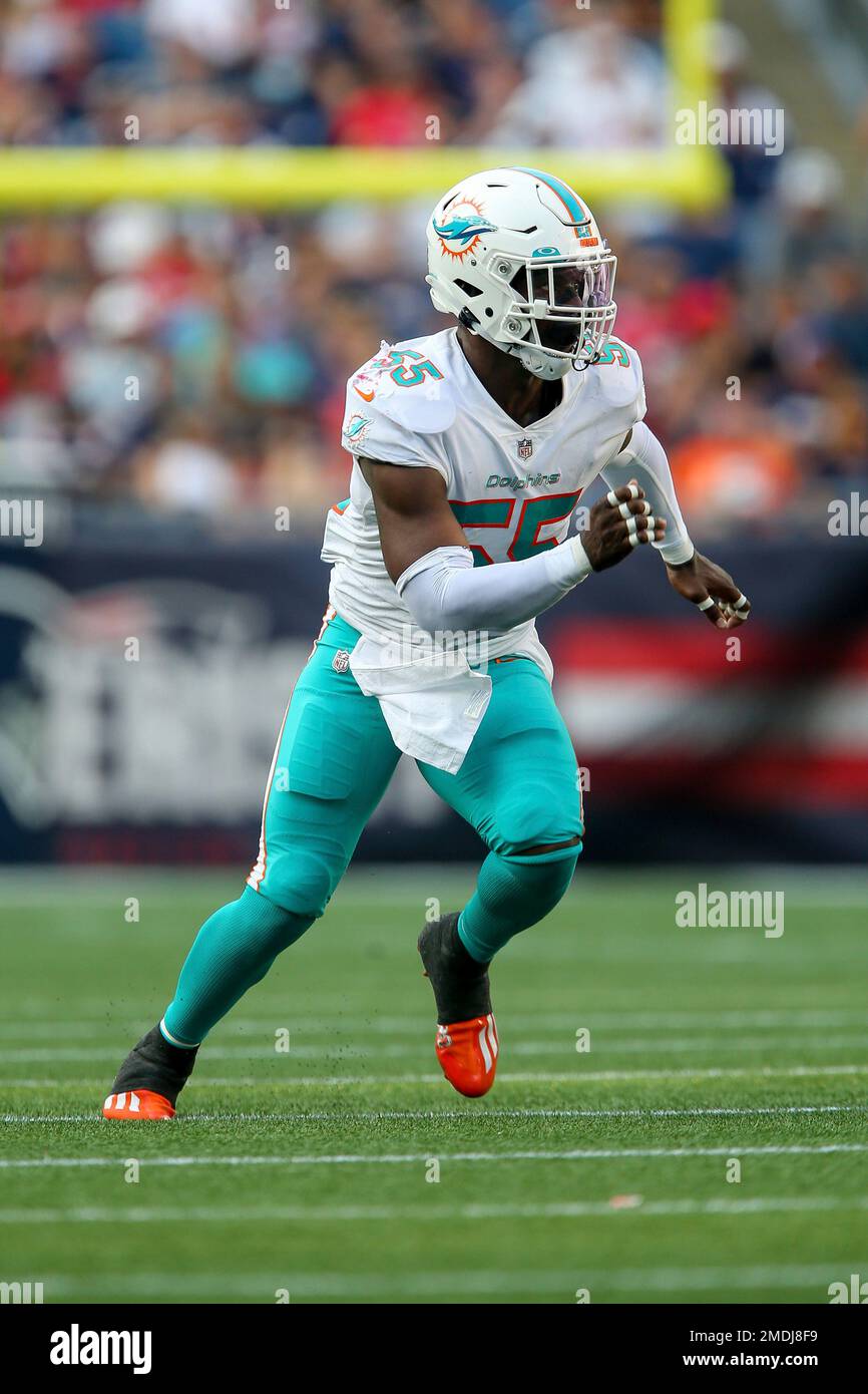 Miami Dolphins outside linebacker Jerome Baker (55) tackles