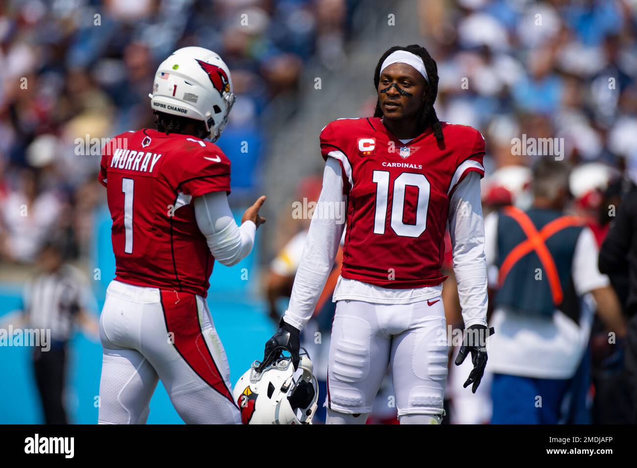 Arizona Cardinals quarterback Kyler Murray (1) runs with the ball against  the Tennessee Titans …