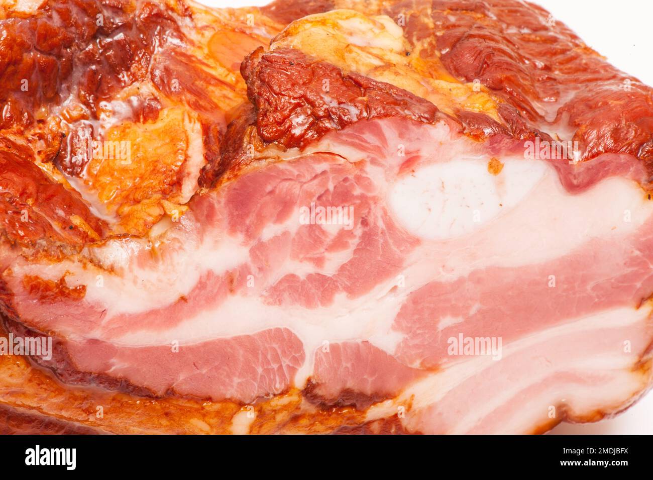Smoked lard with a layer of meat on a white background Stock Photo Alamy