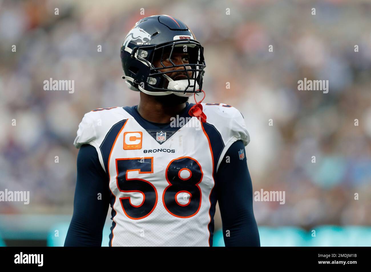 Denver Broncos outside linebacker Von Miller (58) walks on the field in  between plays during an NFL football game against the New York Giants,  Sunday, Sept. 12, 2021, in East Rutherford, N.J.