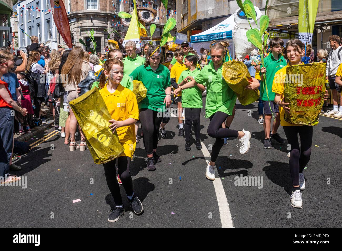 Students from Humphry Davy School in a parade on Mazey Day in the the Golowan festival in Penzance in Cornwall in the UK. Stock Photo