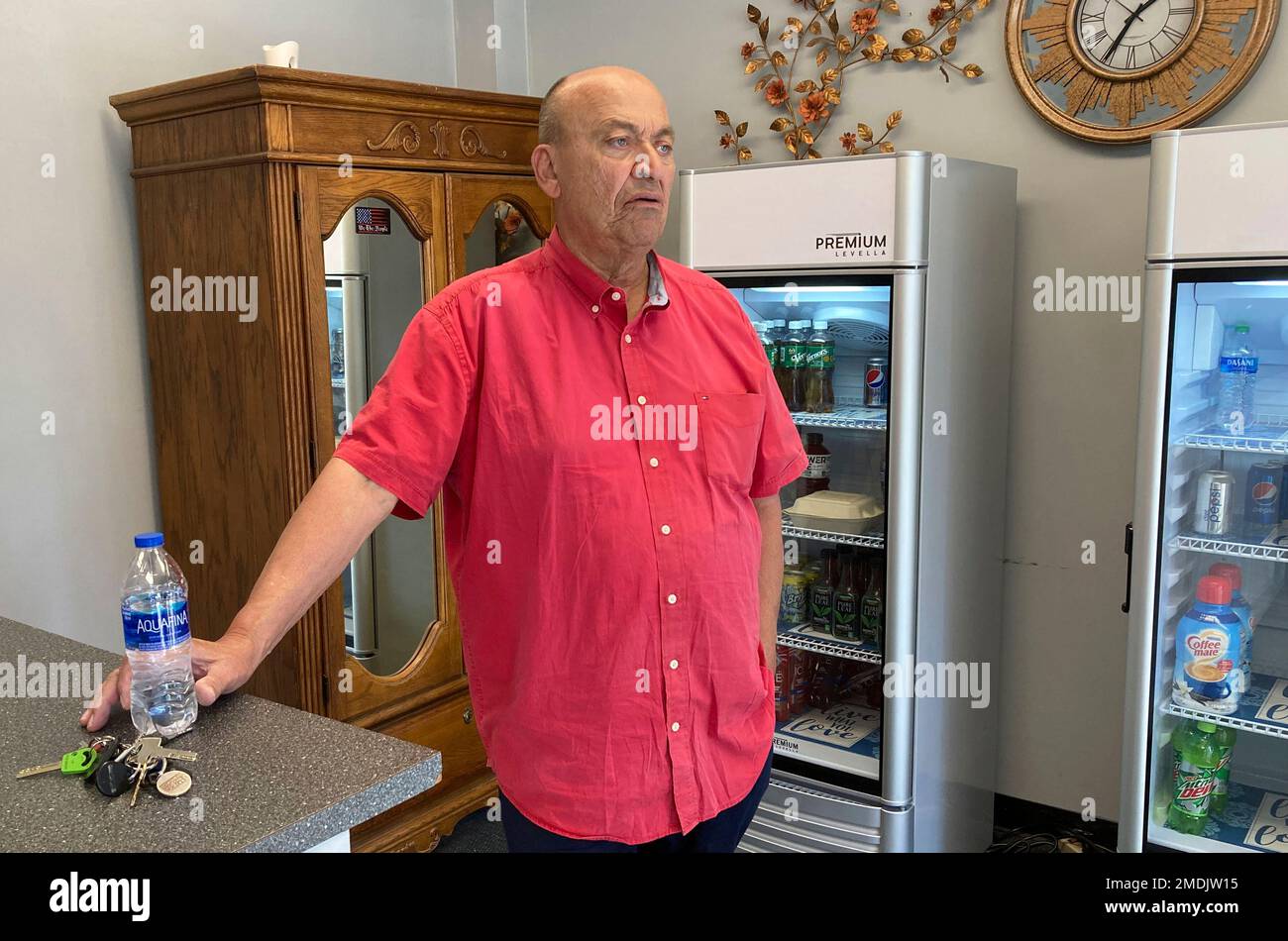 Mike Frank, owner of Clifford Street Cleaners, stands in the lobby 
