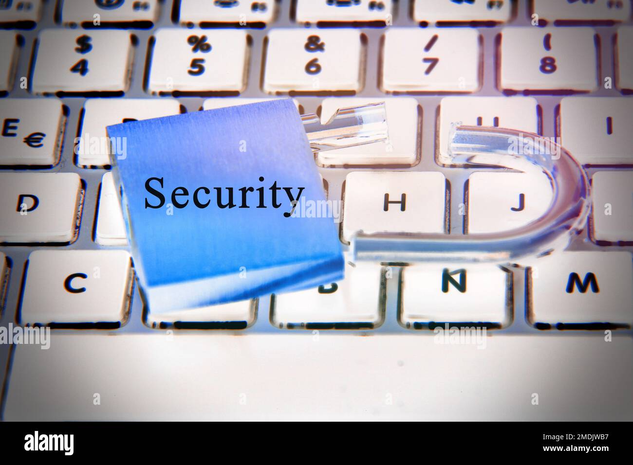 Broken Metal lock on laptop, top view. Cyber security concept Stock Photo