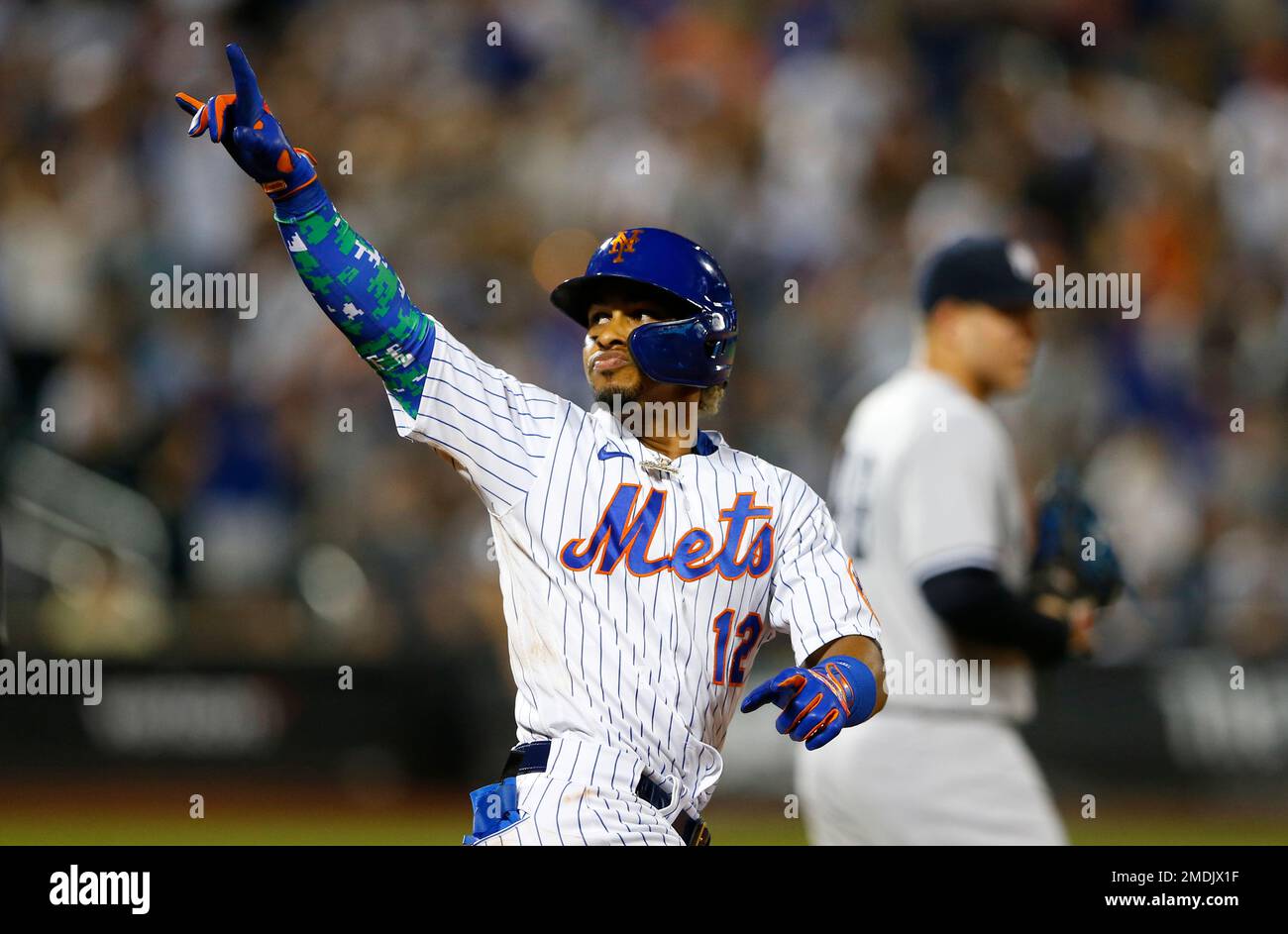 New York Mets' Francisco Lindor (12) reacts after his second home run in a  baseball game against the New York Yankees in the sixth inning, Sunday,  Sept. 12, 2021, in New York. (