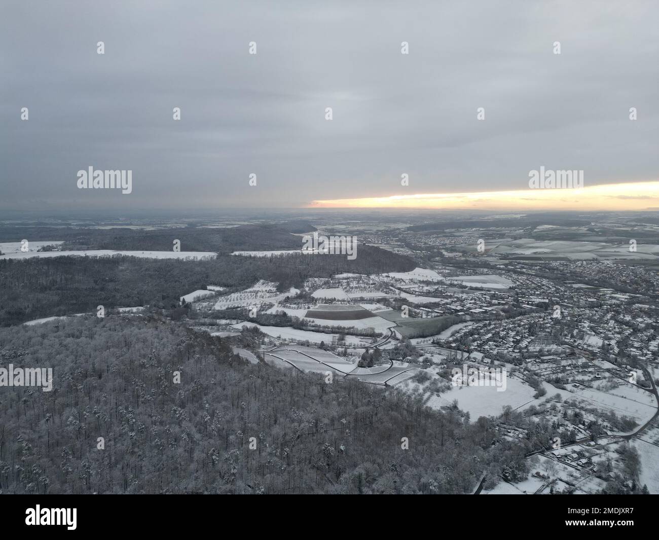 An aerial view of a snow covered village in rural landscape Stock Photo ...
