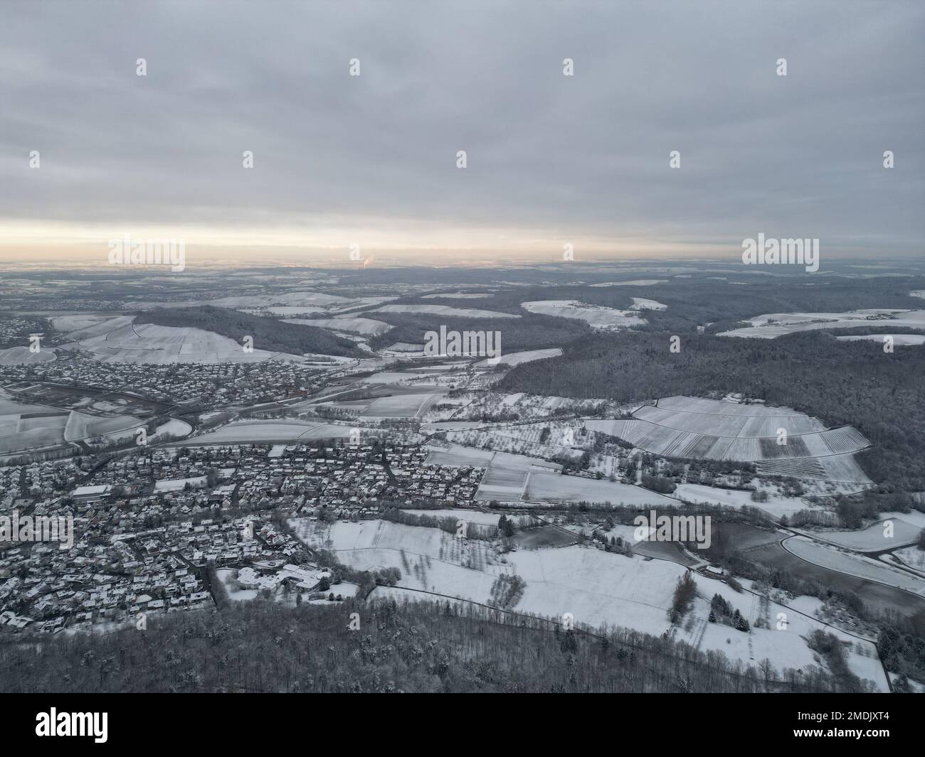 An aerial view of a snow covered village in rural landscape Stock Photo ...