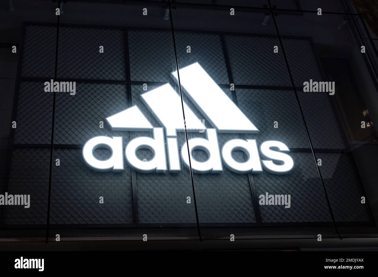 Tokyo, Japan. 18th Jan, 2023. An Adidas flagship retail location near  Shinjuku Station, the world's busiest train station.Adidas is a  multinational corporation that designs and manufactures shoes, clothing and  accessories. The company