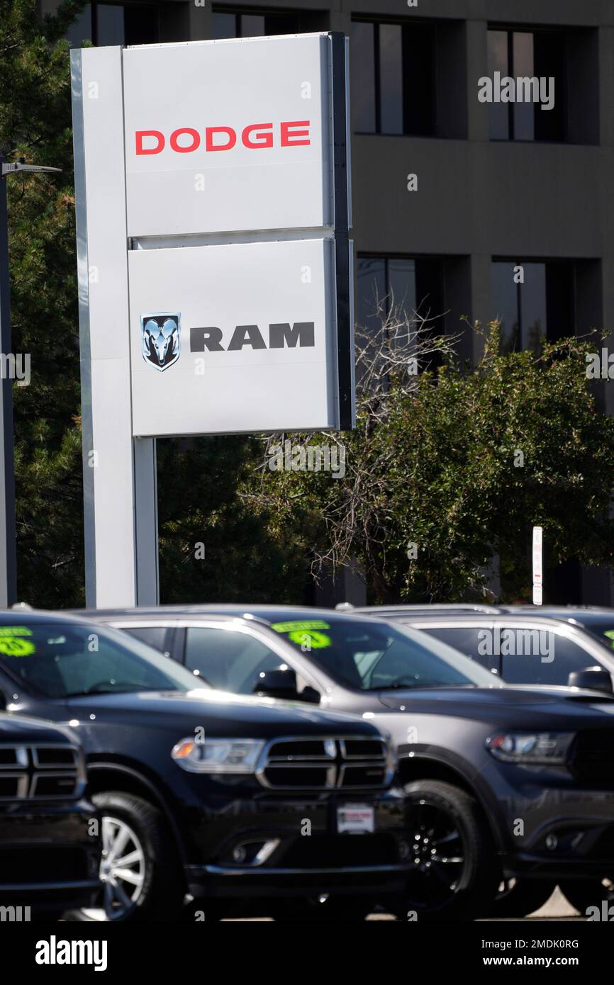 Unsold used pickup trucks and sportsutility vehicles sit at a Dodge