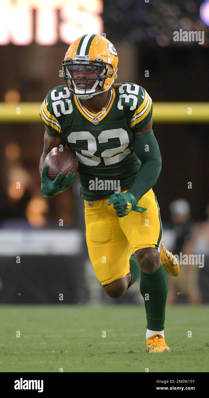 Green Bay Packers running back Kylin Hill (32) against the New