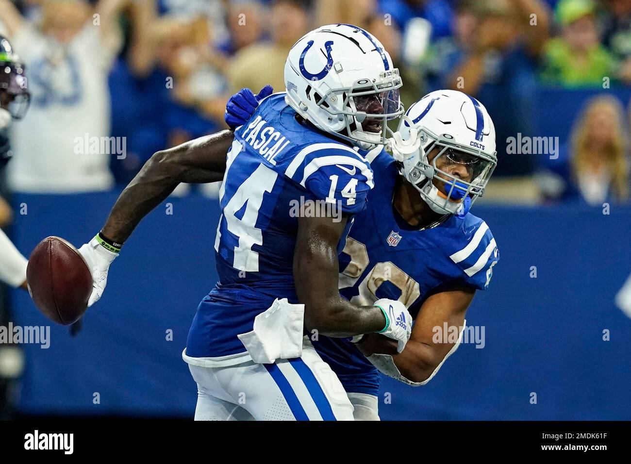 Indianapolis Colts wide receiver Zach Pascal (14) celebrates touchdown  against the Seattle Seahawks with running back Jonathan Taylor (28) in the  second half of an NFL football game in Indianapolis, Sunday, Sept.