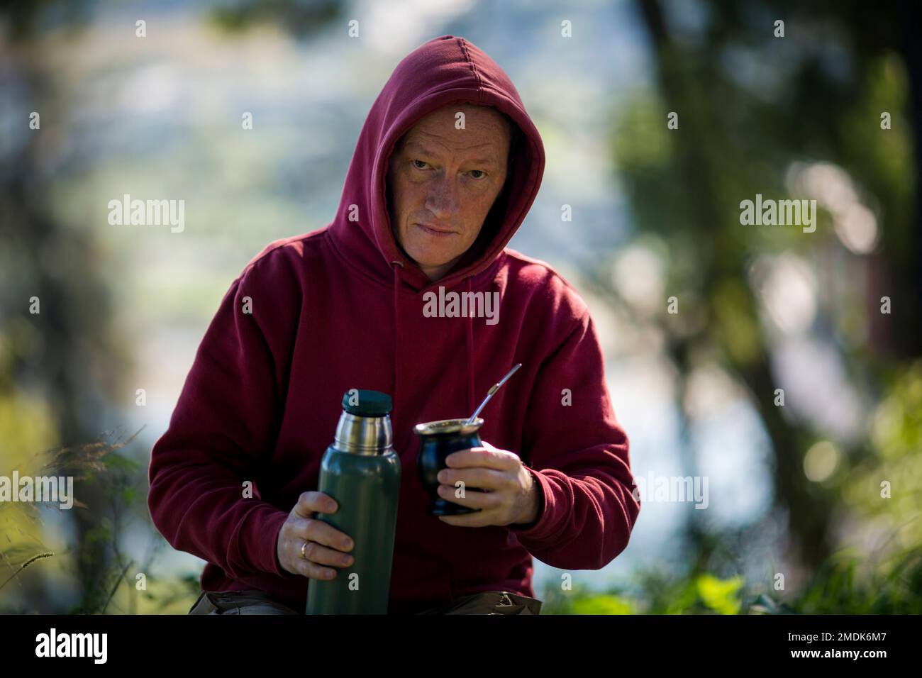 Portrait of a man drinks Mate in the Park. Stock Photo