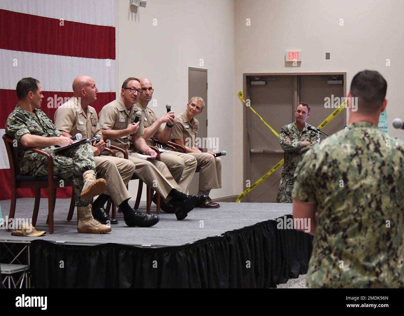 Participants of the MTF Perspective on Mental Health Panel answer audience questions on day one of Naval Information Forces’ inaugural Mental Health Summit July 25-26. The panel from left to right consists of Capt. Andy Van Slyke, senior mental health executive, Naval Medical Forces Atlantic; Capt. Mike Franks (PHS), department head mental health, Naval Medical Center Portsmouth; Capt. Ralph Tuttle, director for mental health, Naval Medical Center Portsmouth; Lt. Cmdr. Chris Heath, department head SARP, Naval Medical Center Portsmouth; and Capt. Shelly Perkins, commanding officer, Naval Medica Stock Photo