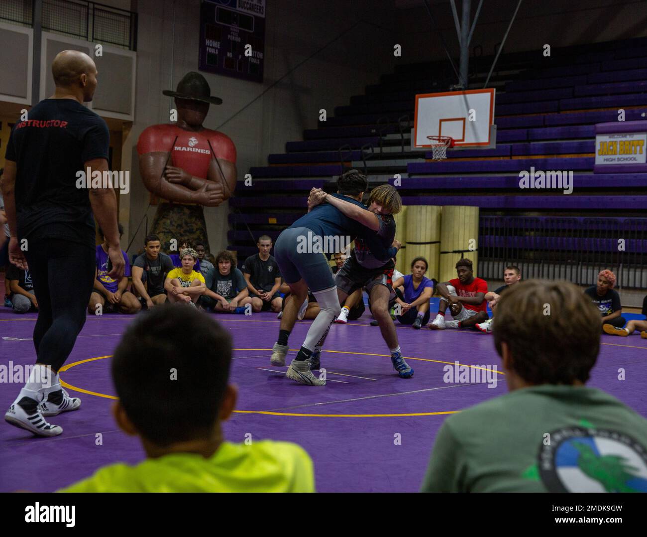 Athletes and coaches participated in a wrestling clinic hosted by Johnson's Athletic Camps and