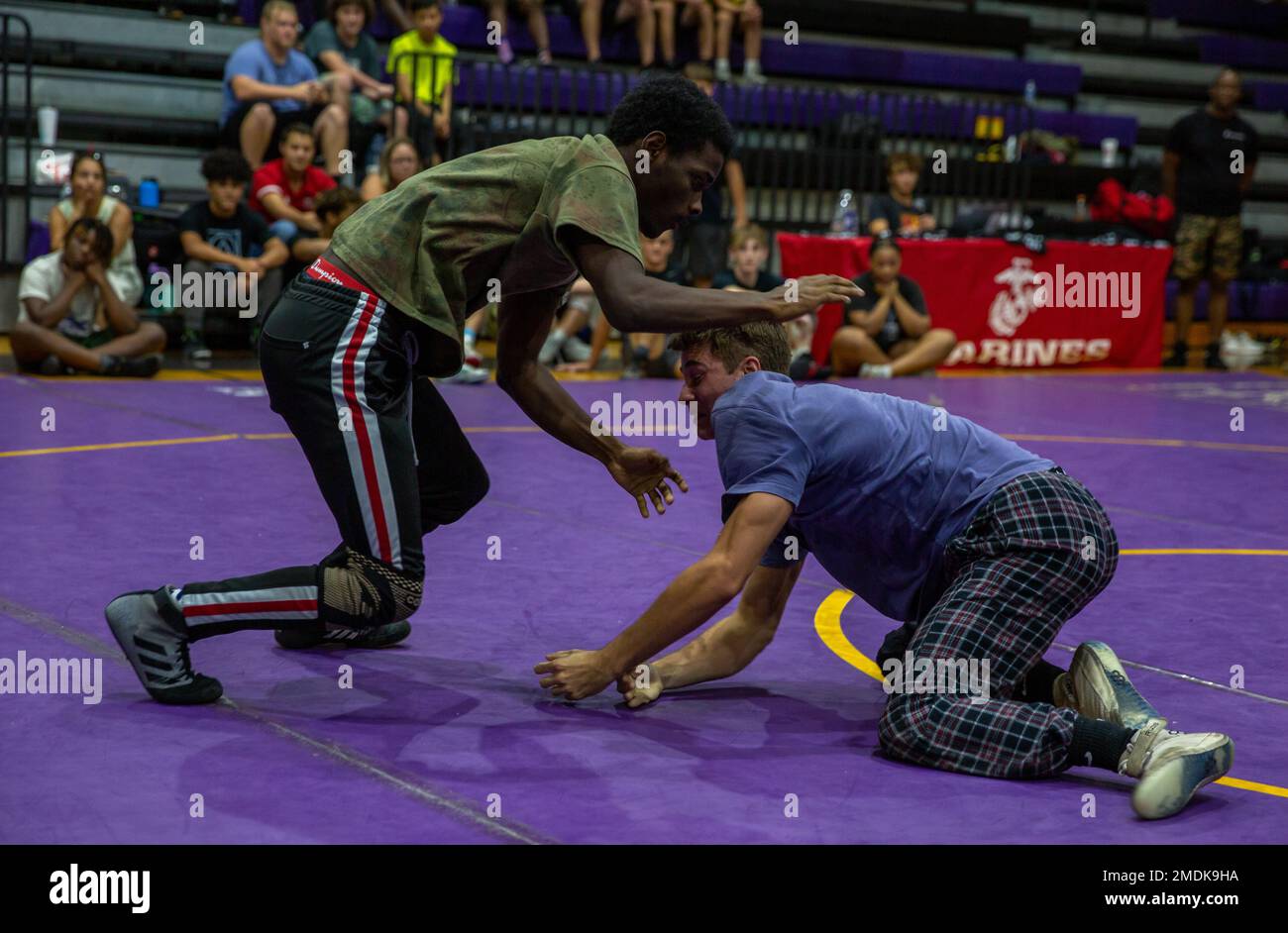 Athletes and coaches participated in a wrestling clinic hosted by Johnson's Athletic Camps and