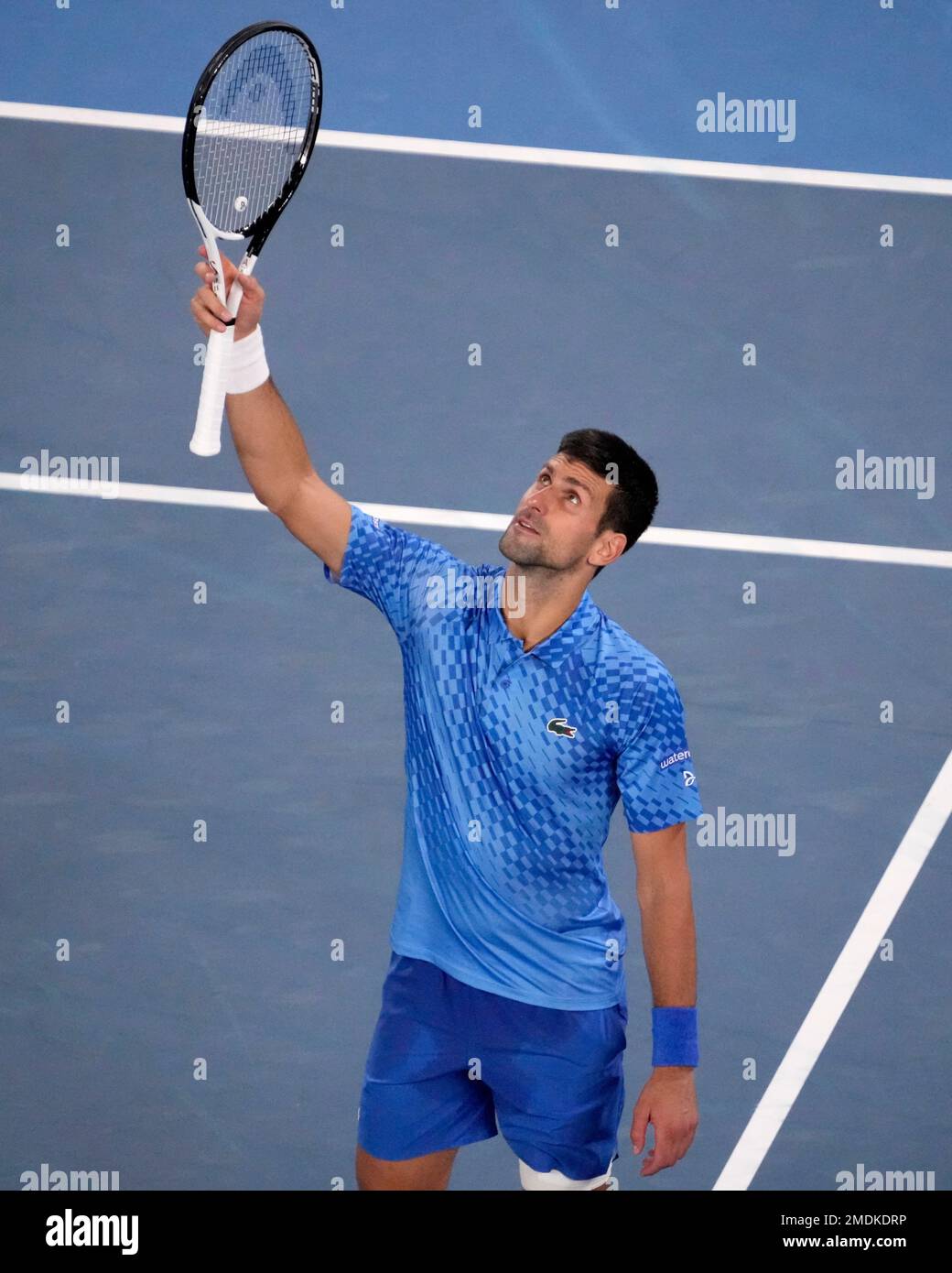 Novak Djokovic of Serbia reacts after defeating Alex de Minaur of Australia in their fourth round match at the Australian Open tennis championship in Melbourne, Australia, Monday, Jan