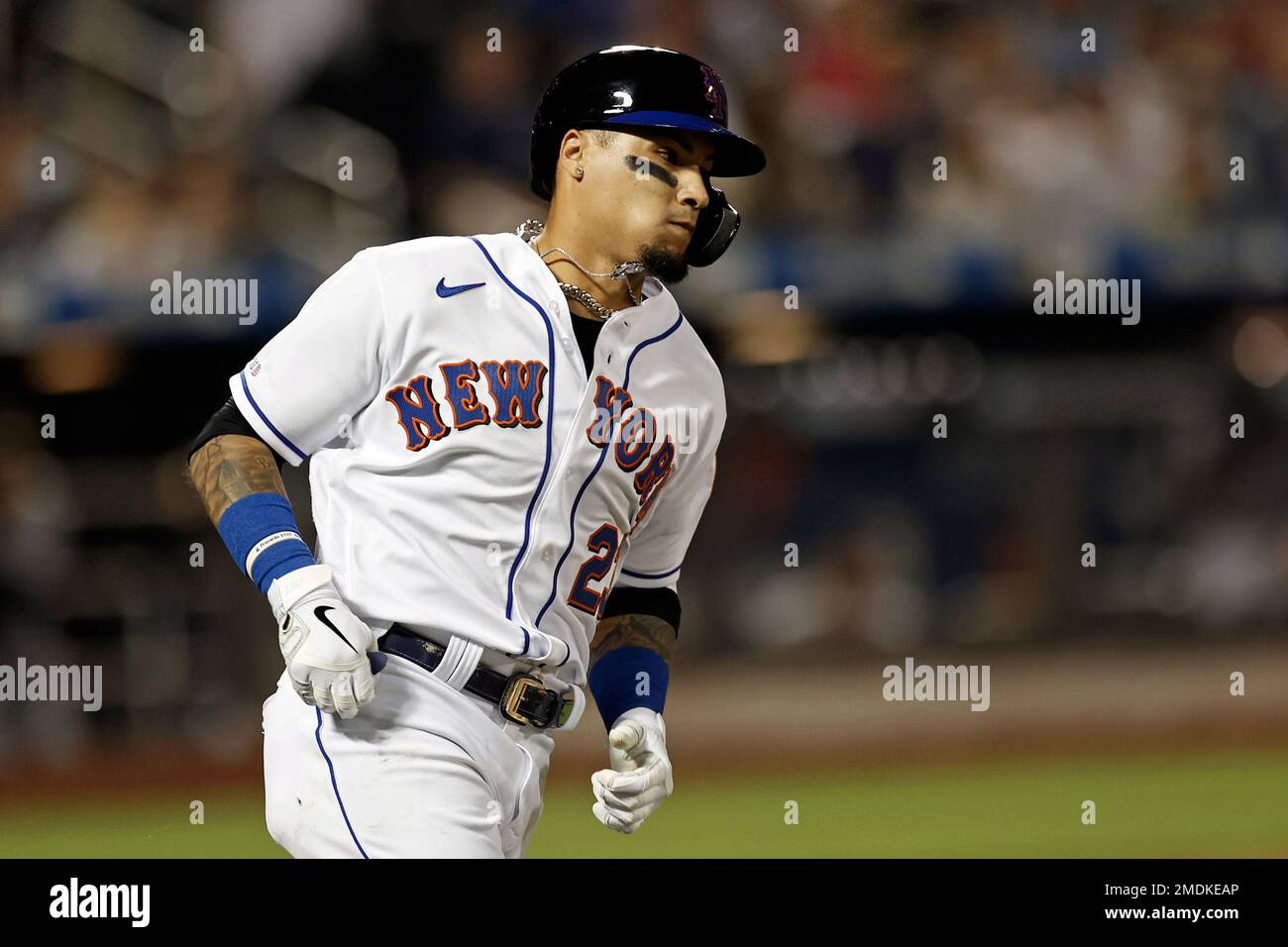New York Mets' Javier Baez rounds the bases after hitting a home run  against the New York Yankees during the third inning of a baseball game on  Saturday, Sept. 11, 2021, in