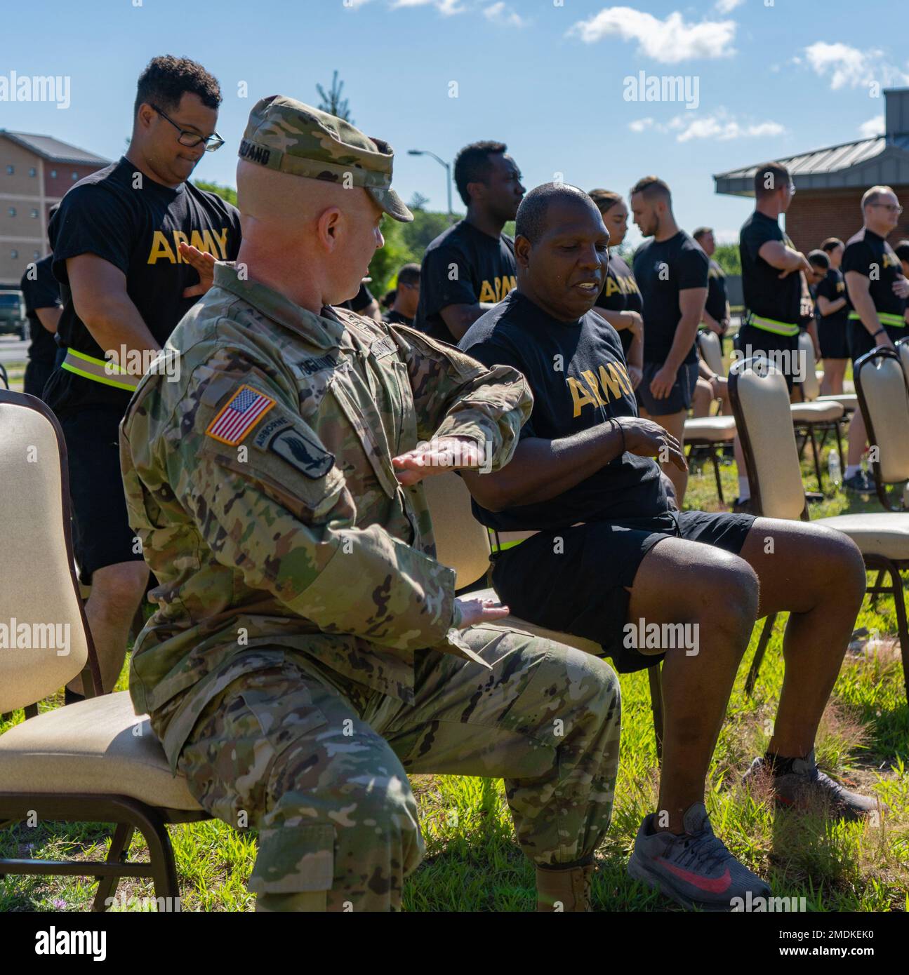 1st Lt. Nicholas Pugliano, left, shows Sgt. Kemoh Smith proper hip and ...