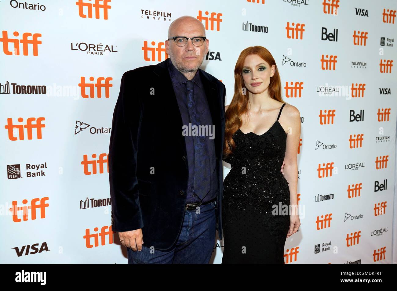 John Michael McDonagh, left, writer/director of "The Forgiven," poses