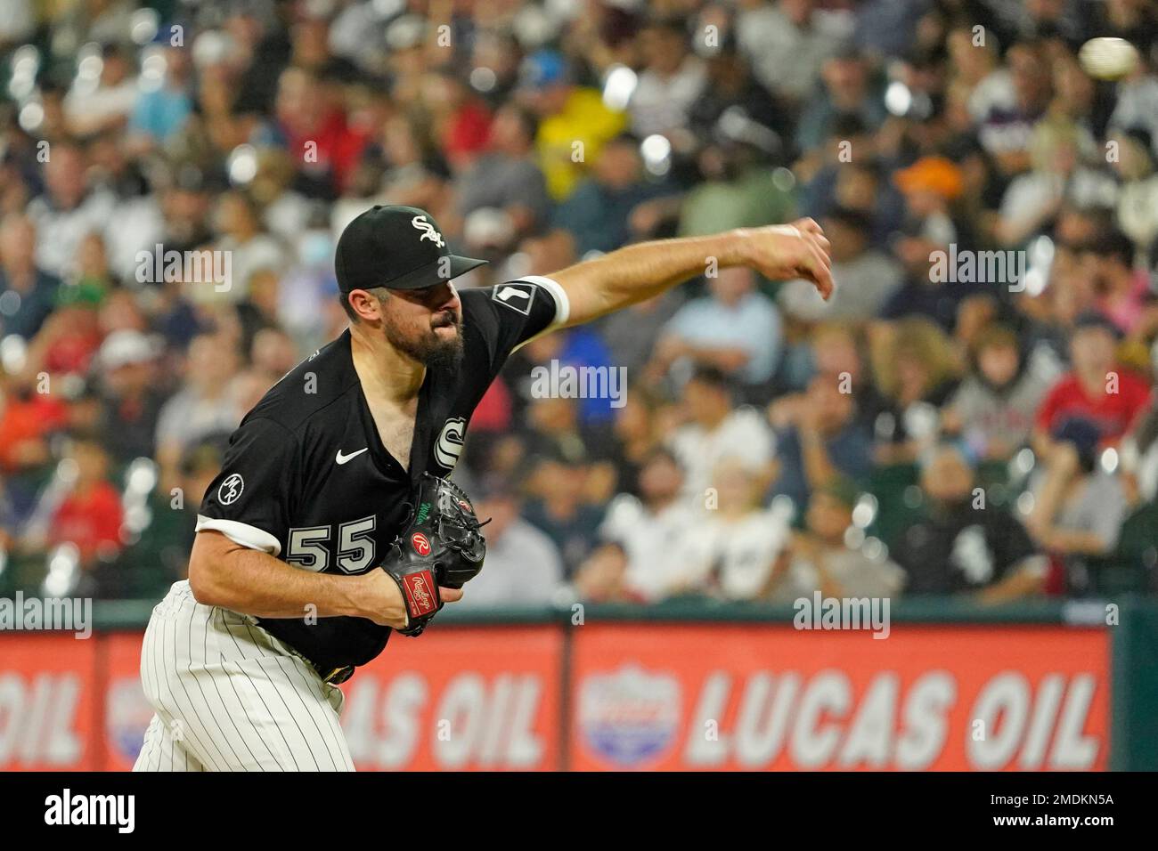 Chicago White Sox starting pitcher Carlos Rodon (55) throws