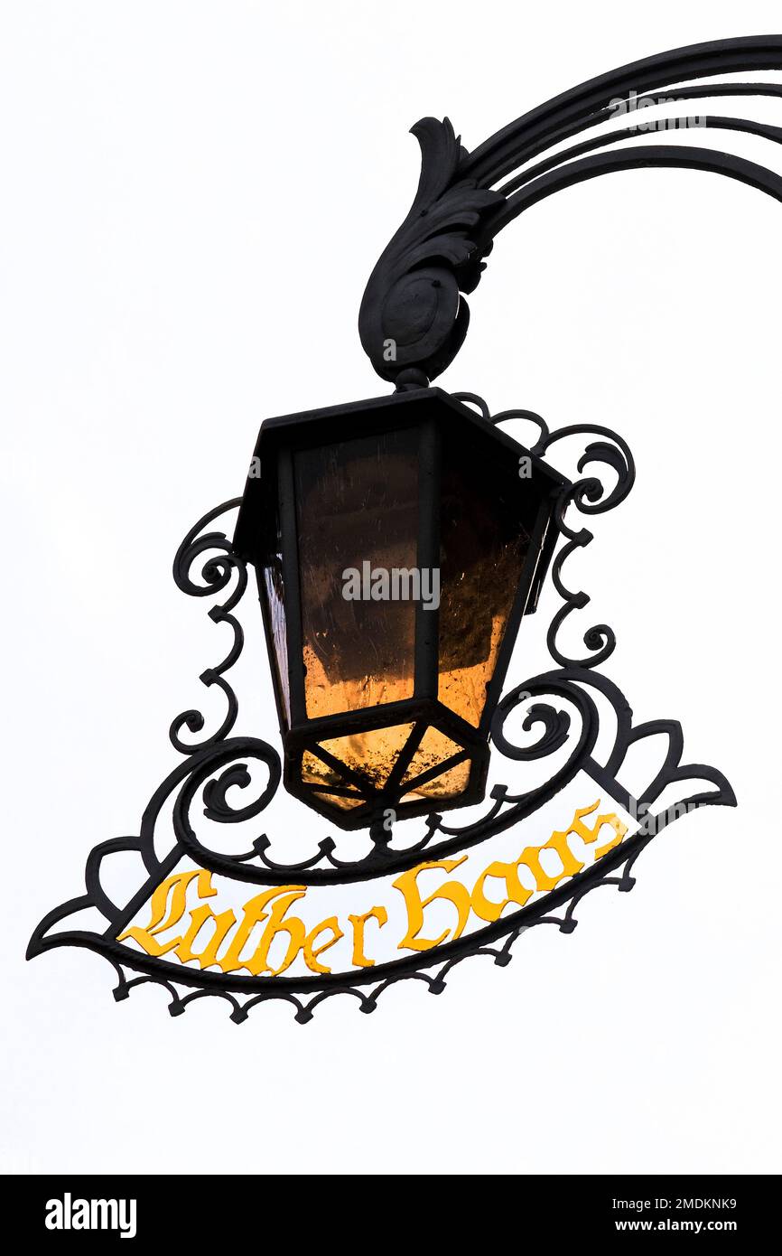 wrought-iron lantern with cantilever sign at Lutherhaus, Germany, Thueringen, Eisenach Stock Photo