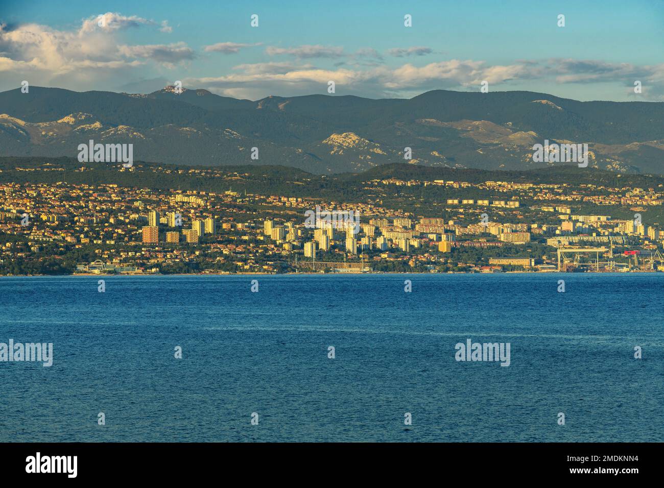 Rijeka, town on Croatian Adriatic sea coastline seen from the Kvarner gulf shoreline and town of Lovran Stock Photo