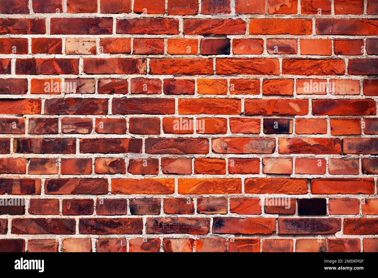 Vitrified rustic brick wall tile pattern as background. Scandinavian architecture style detail from Halmstad in Sweden. Stock Photo