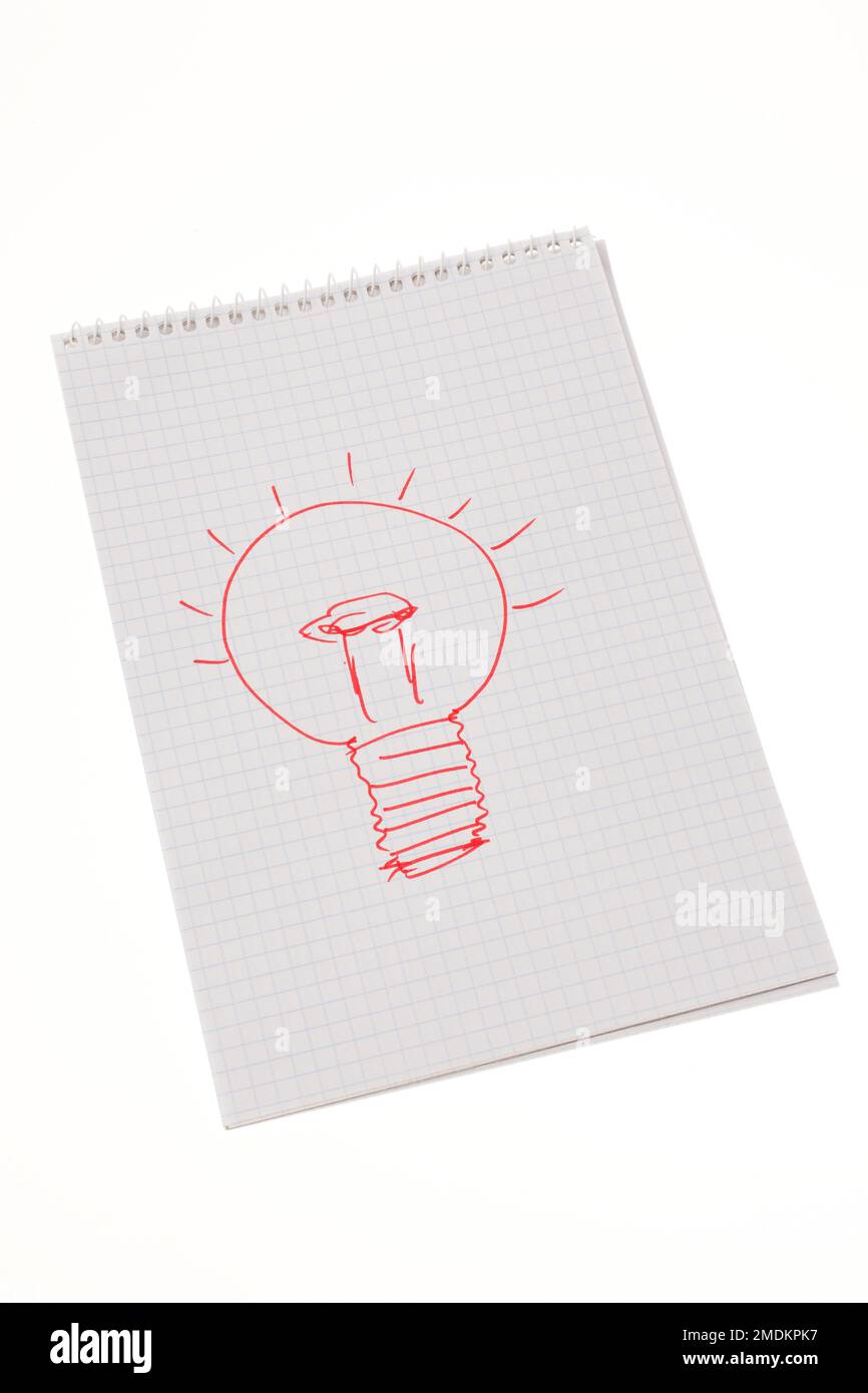 sheet of paper with a drawing of an electric bulb Stock Photo