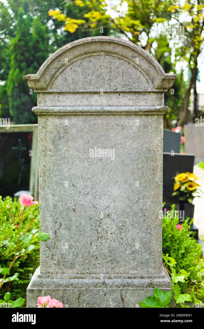 gravestone in a cemetery Stock Photo