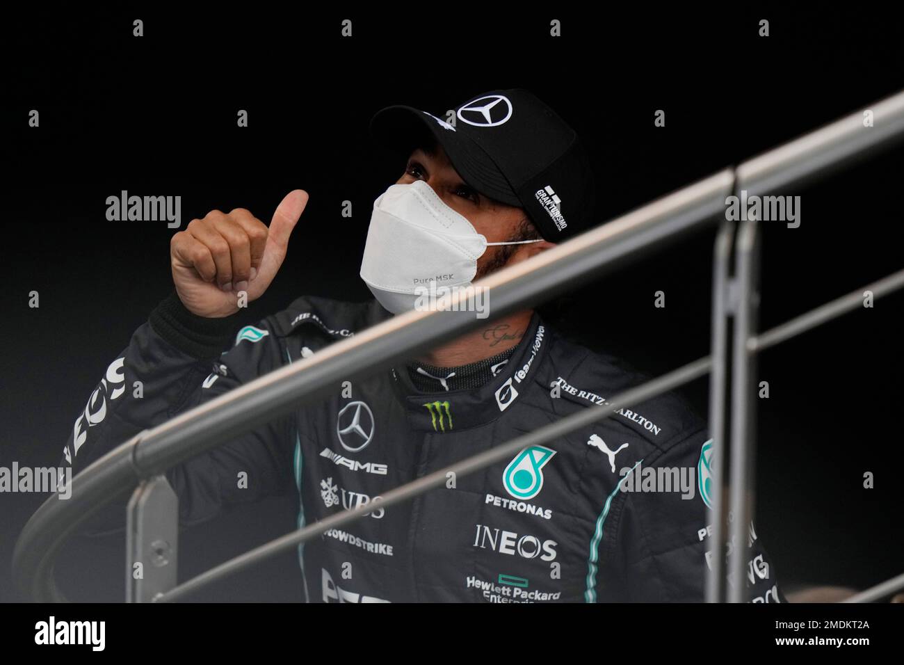 Mercedes driver Lewis Hamilton of Britain gives the thumb-up sign after ...