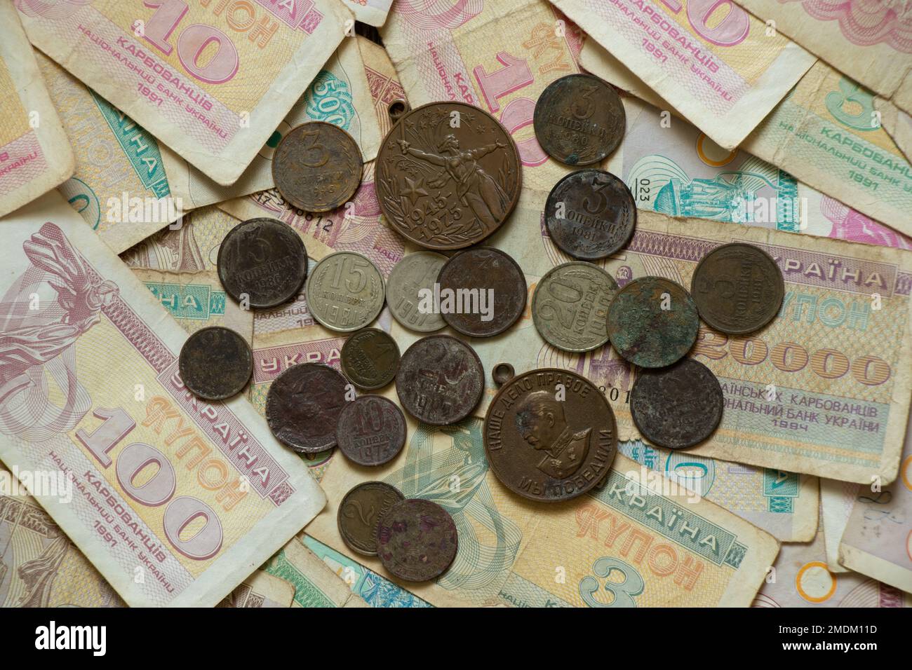 unit of the Ukrainian state coupon and coins of the ussr lie