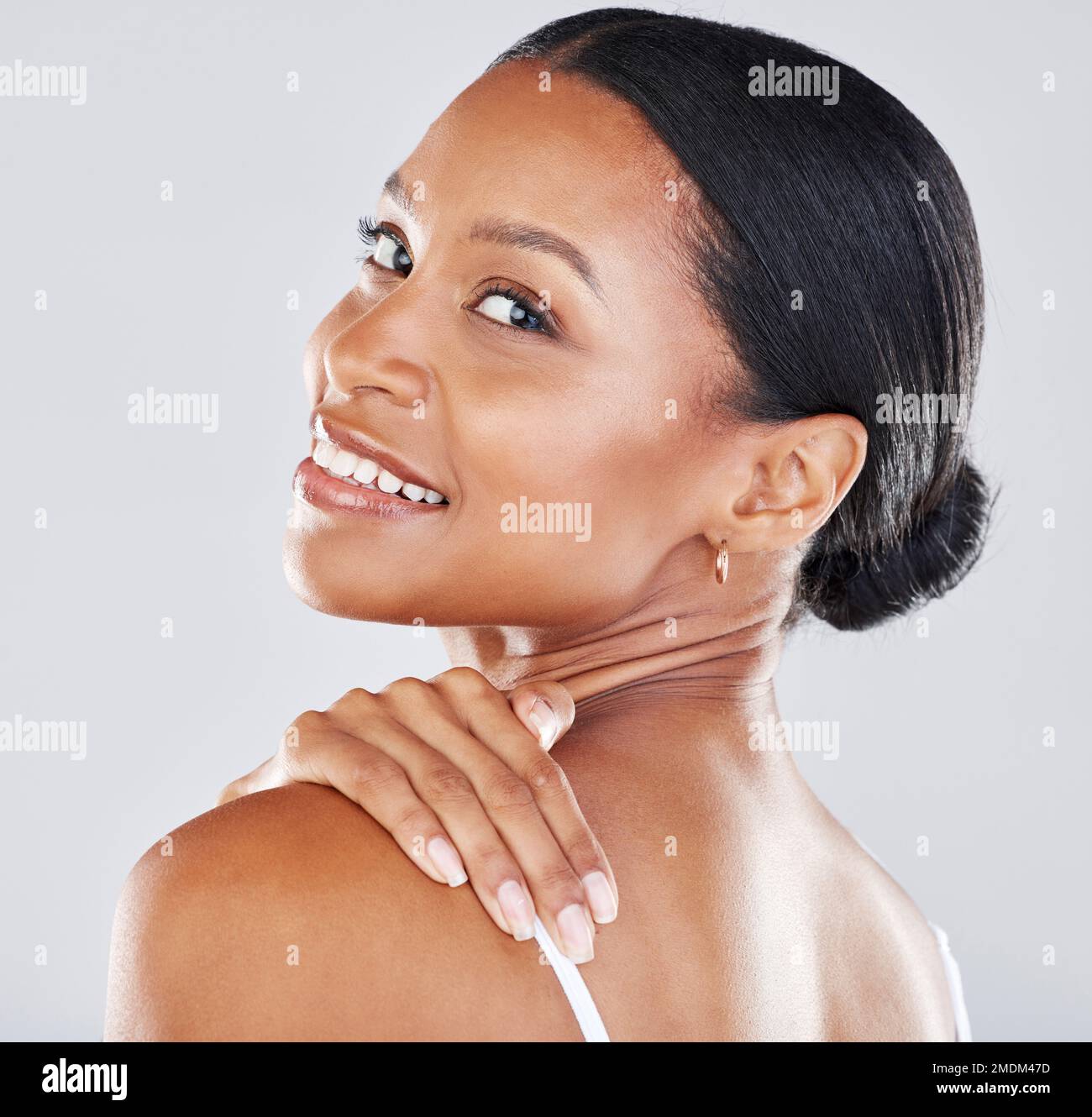 Portrait, face and hand on shoulder with a model black woman in studio ...