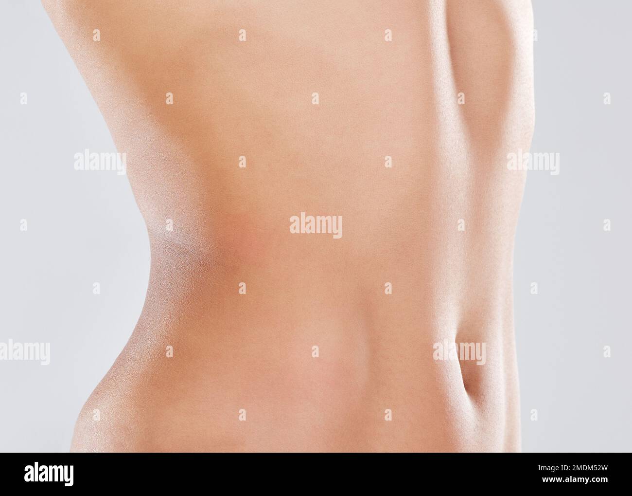 Woman, stomach and slimming wellness or skincare for plastic surgery, liposuction or digestion nutrition in white background. Model, belly and tummy Stock Photo