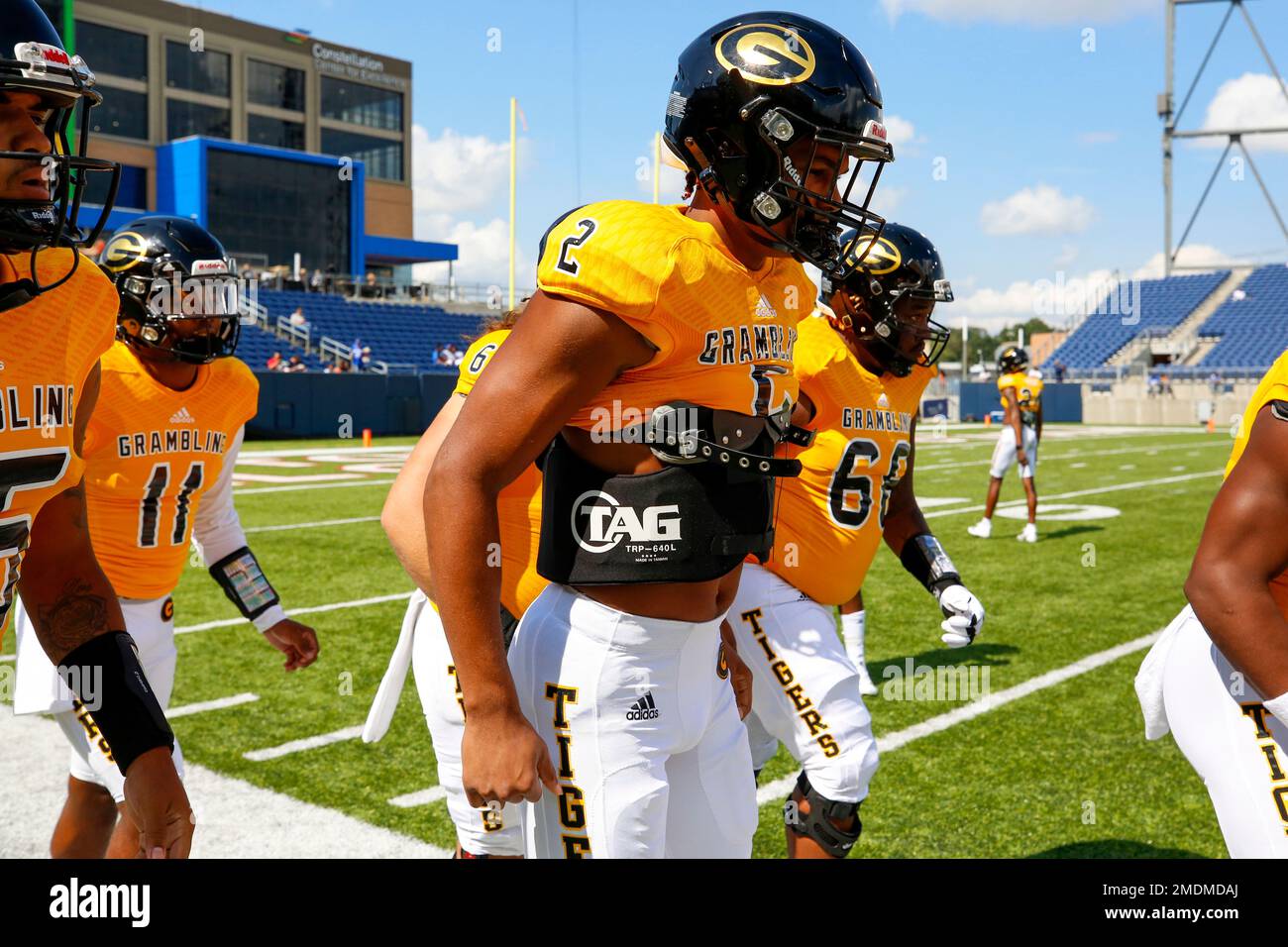 Grambling State junior quarterback Aldon Clark (2) runs on to the field