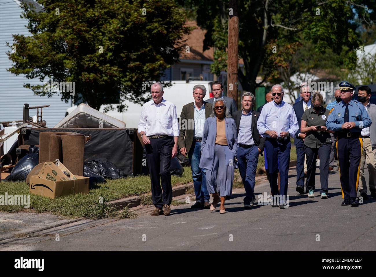 President Joe Biden tours a neighborhood impacted by Hurricane Ida