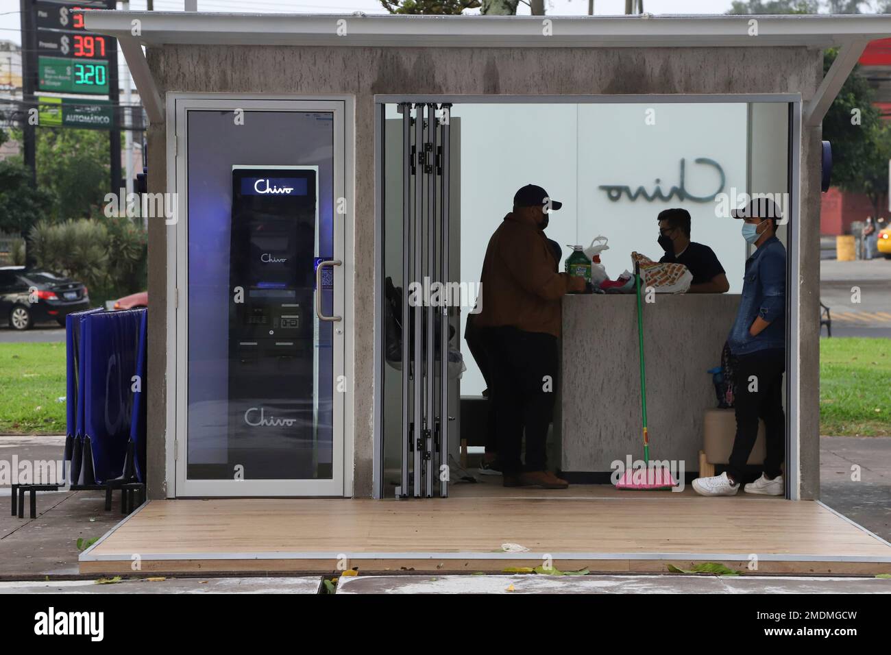 Government employees open the customer service area of a Chivo digital  wallet machine, which exchanges cash for Bitcoin cryptocurrency, at Las  Americas Square in San Salvador, El Salvador, Tuesday, Sept. 7, 2021.