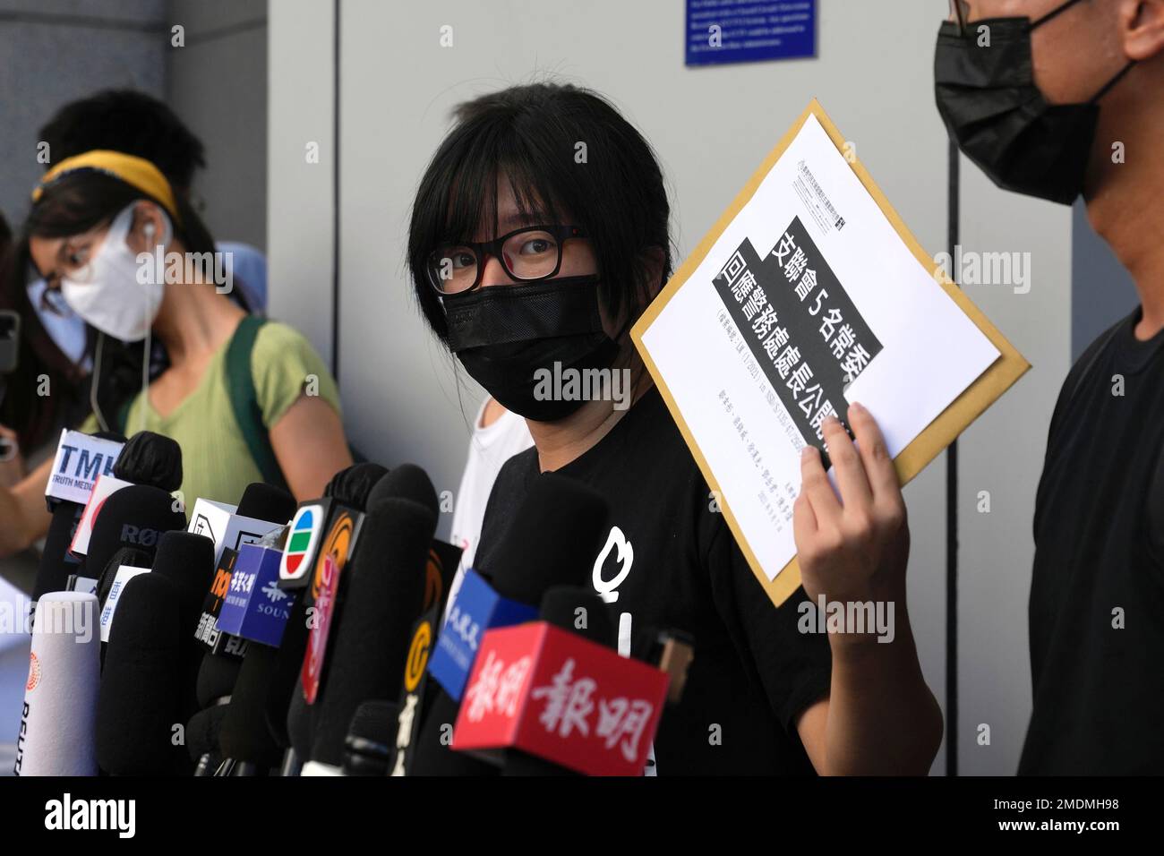 Chow Han Tung, vice chairwoman of the Hong Kong Alliance in Support of  Patriotic Democratic Movements of China, speaks to media before delivering  a letter to the police to reject their information
