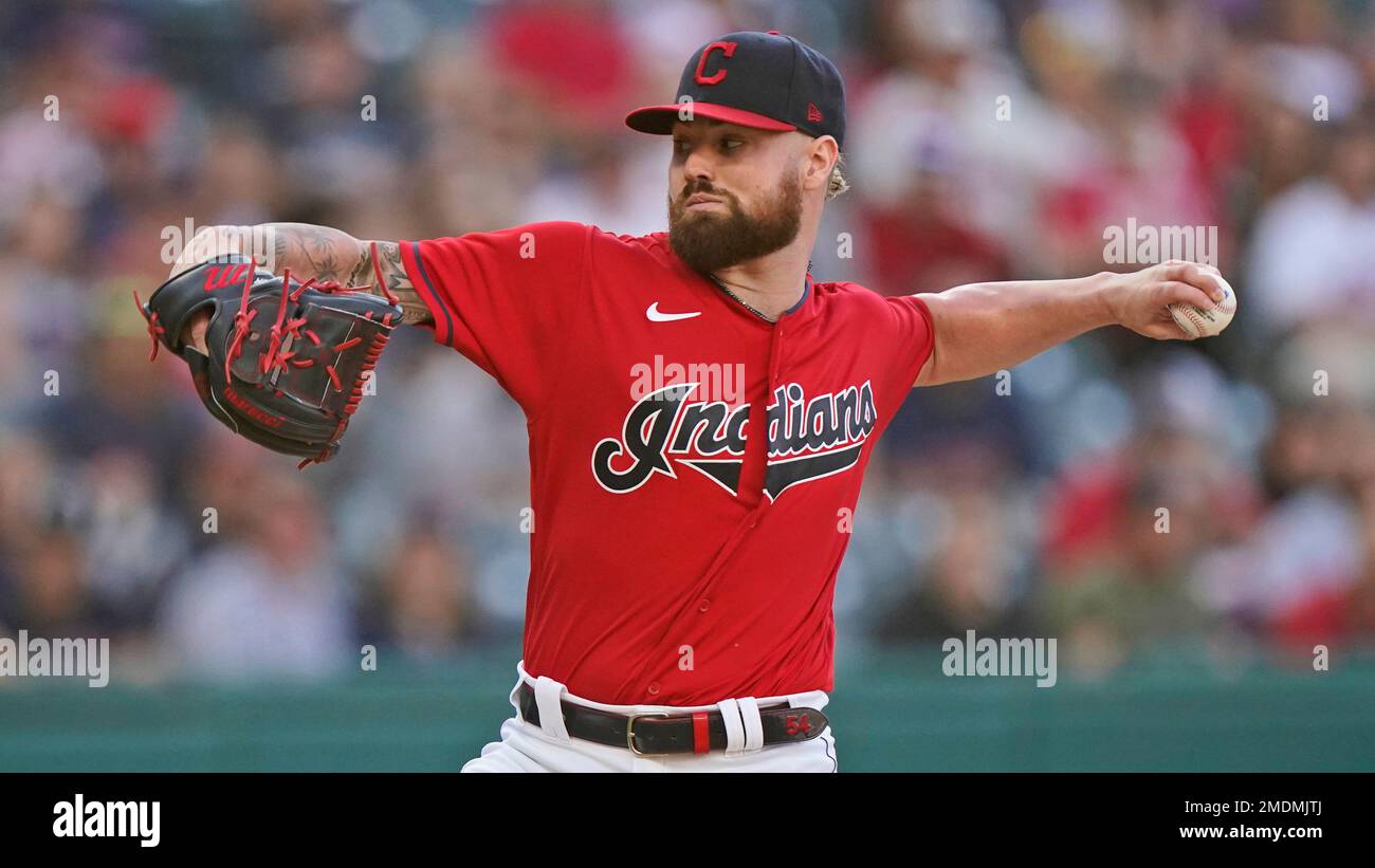 Cleveland Indians starting pitcher Logan Allen delivers in the first