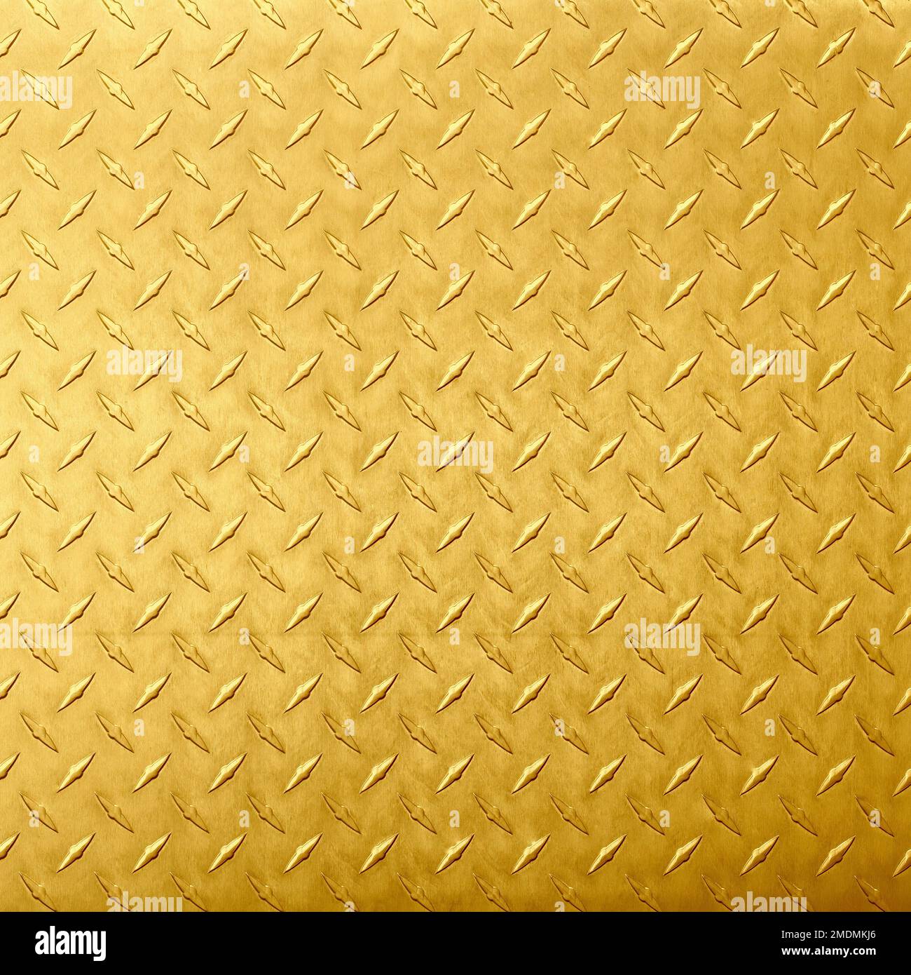 golden metal texture with rhombic pattern. brass or gold background Stock Photo