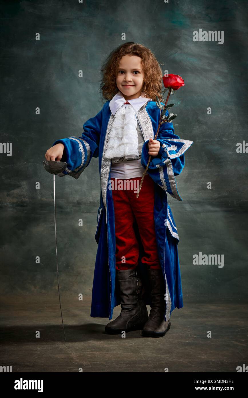Cinematic portair of beautiful little girl dressed up as medieval
