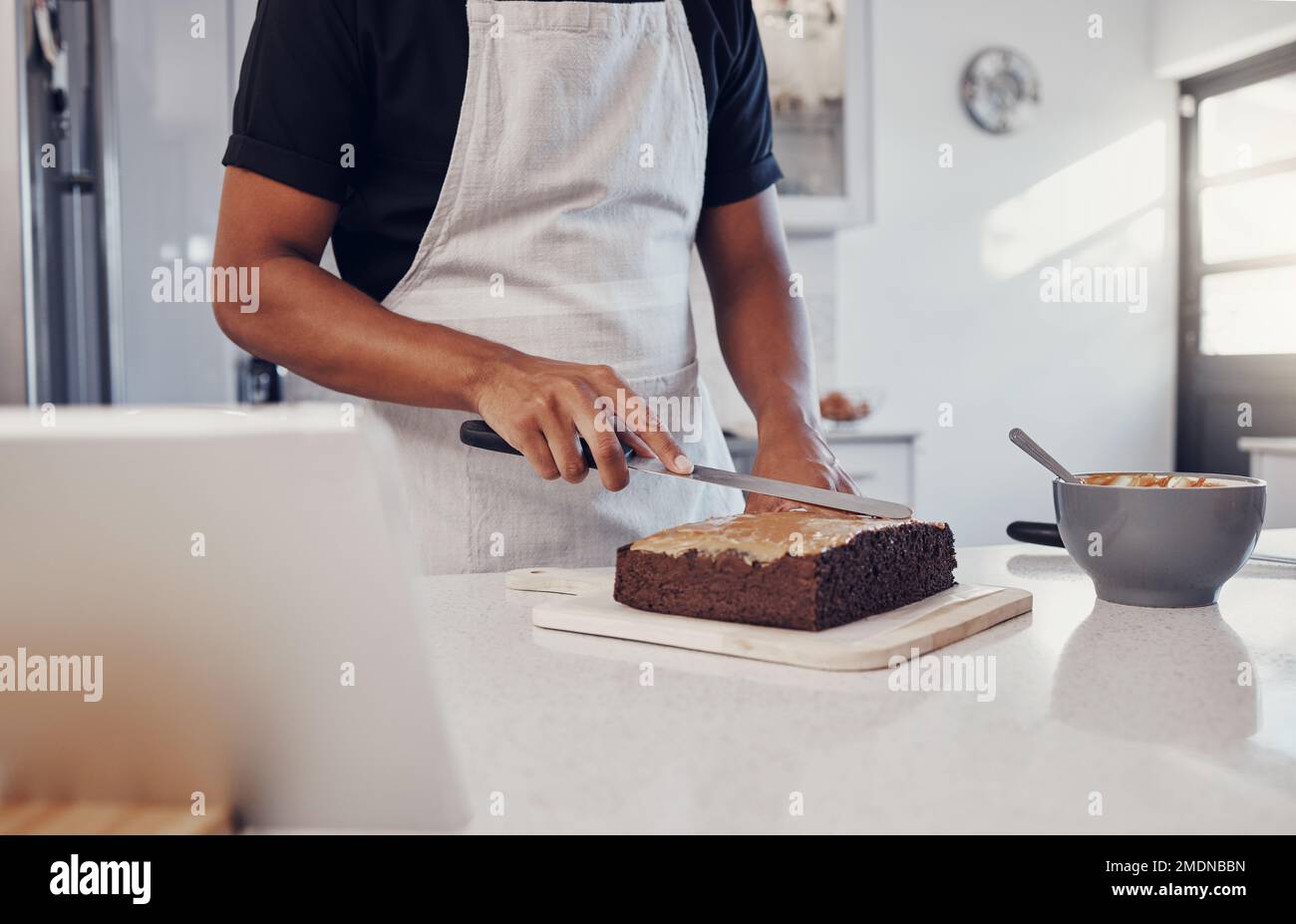 Decoration, baking and man with a cake in the kitchen for birthday food