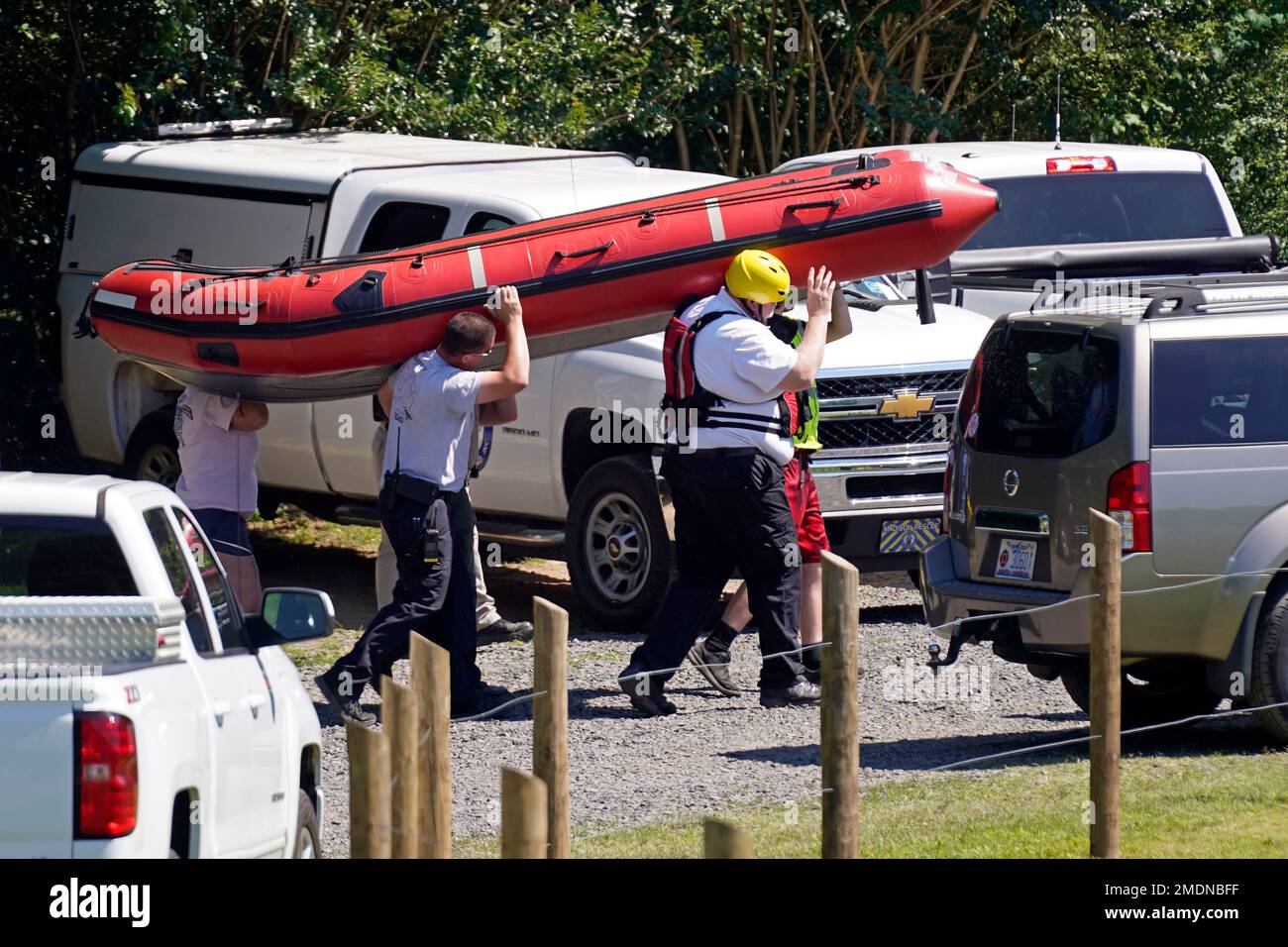 FILE In this June 18, 2021 file photo, rescue personnel stage along
