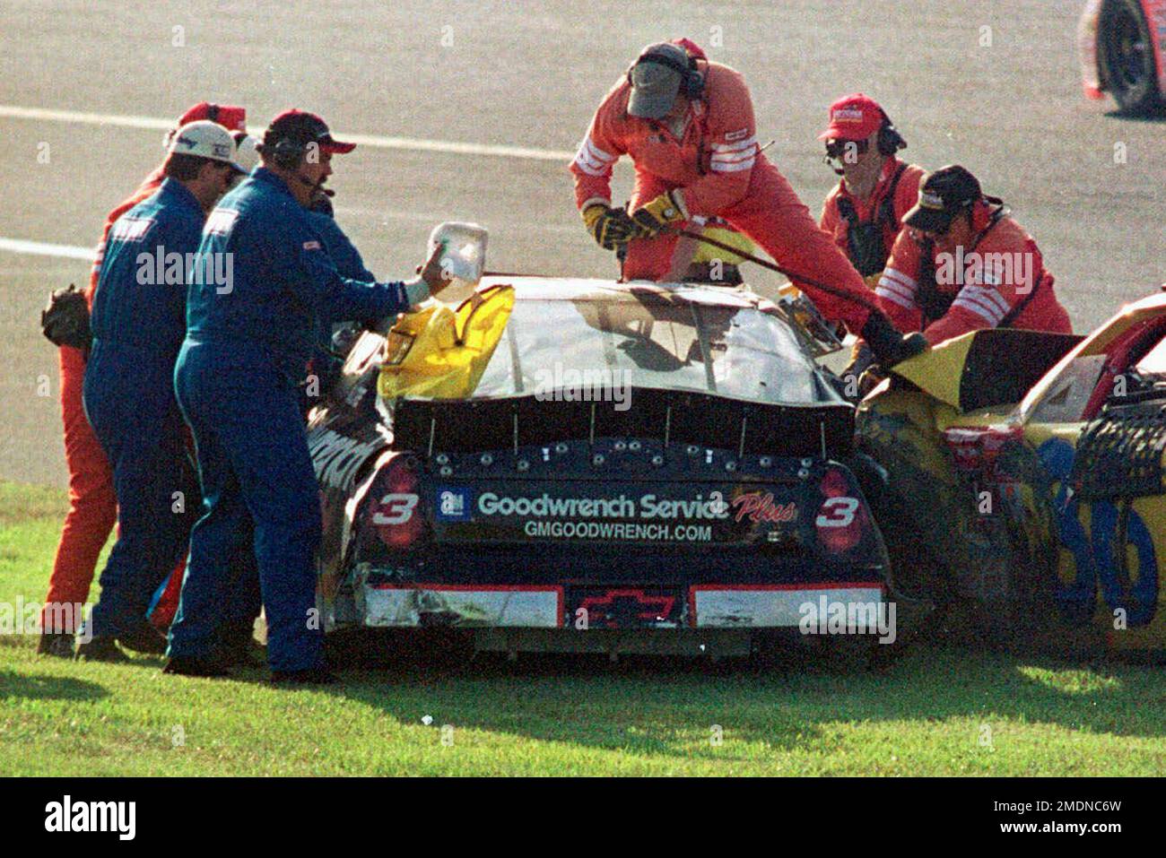 FILE In this Feb. 18, 2001, file photo, workers try to remove Dale