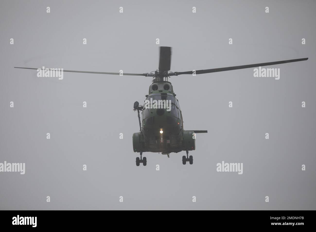 Otopeni, Romania - December 21, 2022: IAR-330 Puma military helicopter of the Romanian Air Forces in flight. Stock Photo