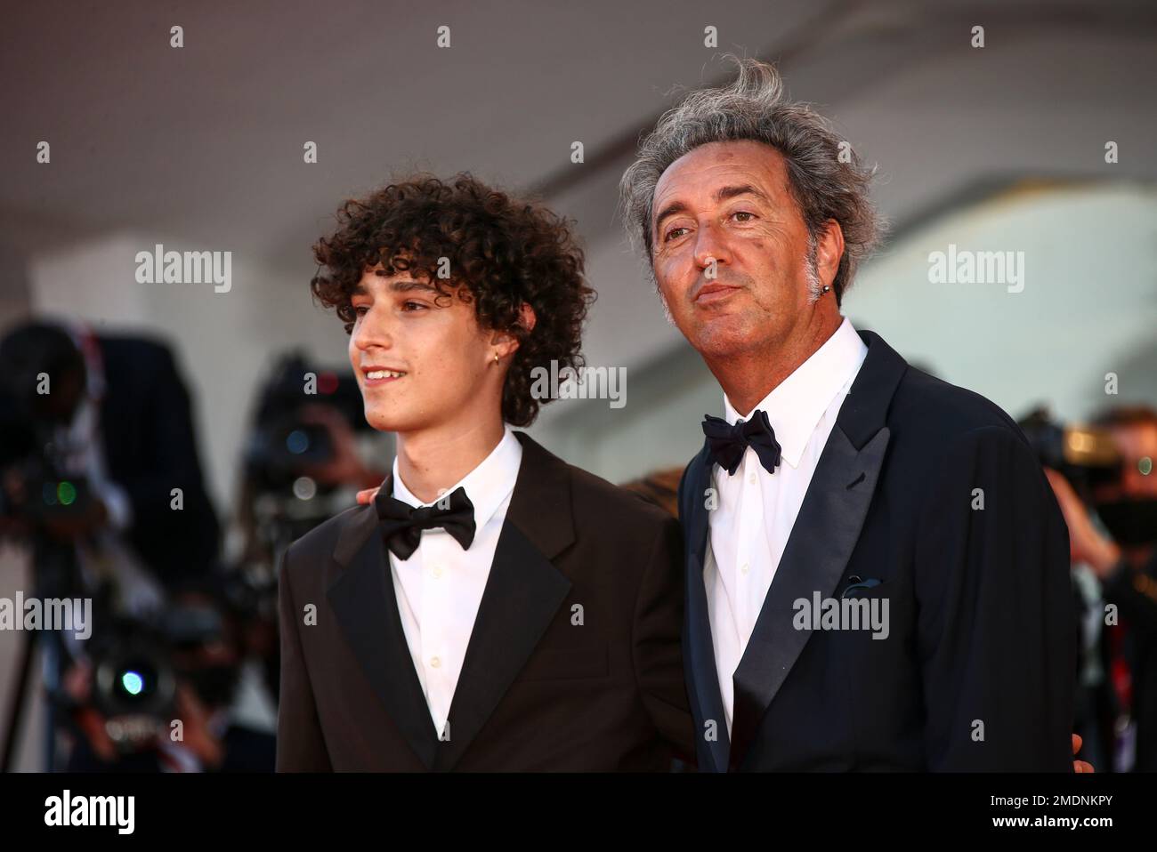 Filippo Scotti, left, and Paolo Sorrentino pose for photographers upon ...