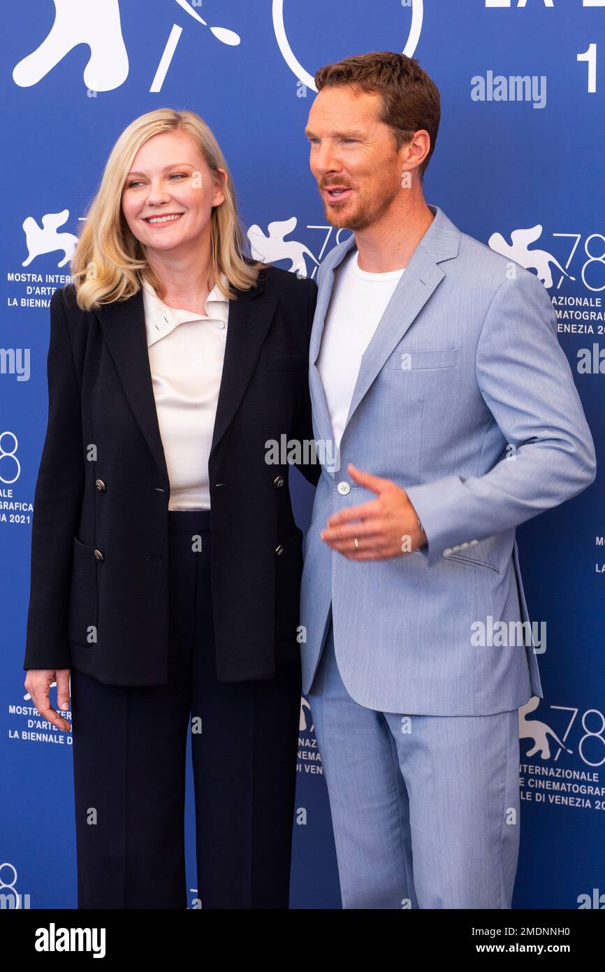 Benedict Cumberbatch, right, and Kirsten Dunst pose for photographers at the photo call for the