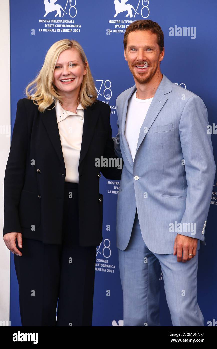 Benedict Cumberbatch, right, and Kirsten Dunst pose for photographers at the photo call for the
