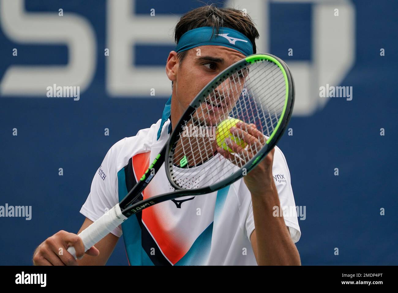Oscar Otte, of Germany, returns a shot against Matteo Berrettini, of Italy, during the fourth round of the US Open tennis championships, Monday, Sept
