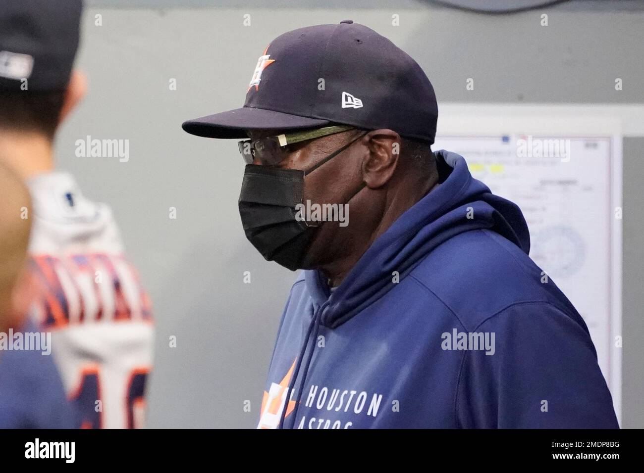Houston Astros manager Dusty Baker Jr. wears a face mask in the dugout  during a baseball game against the Houston Astros, Monday, Aug. 30, 2021,  in Seattle. (AP Photo/Ted S. Warren Stock