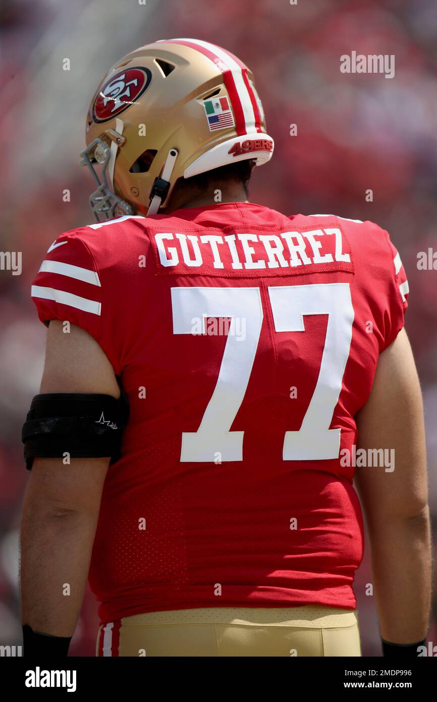 San Francisco 49ers offensive lineman Alfredo Gutierrez (77) stands on the  sideline during an NFL preseason football game against the Green Bay  Packers, Friday, Aug. 12, 2022, in Santa Clara, Calif. (AP