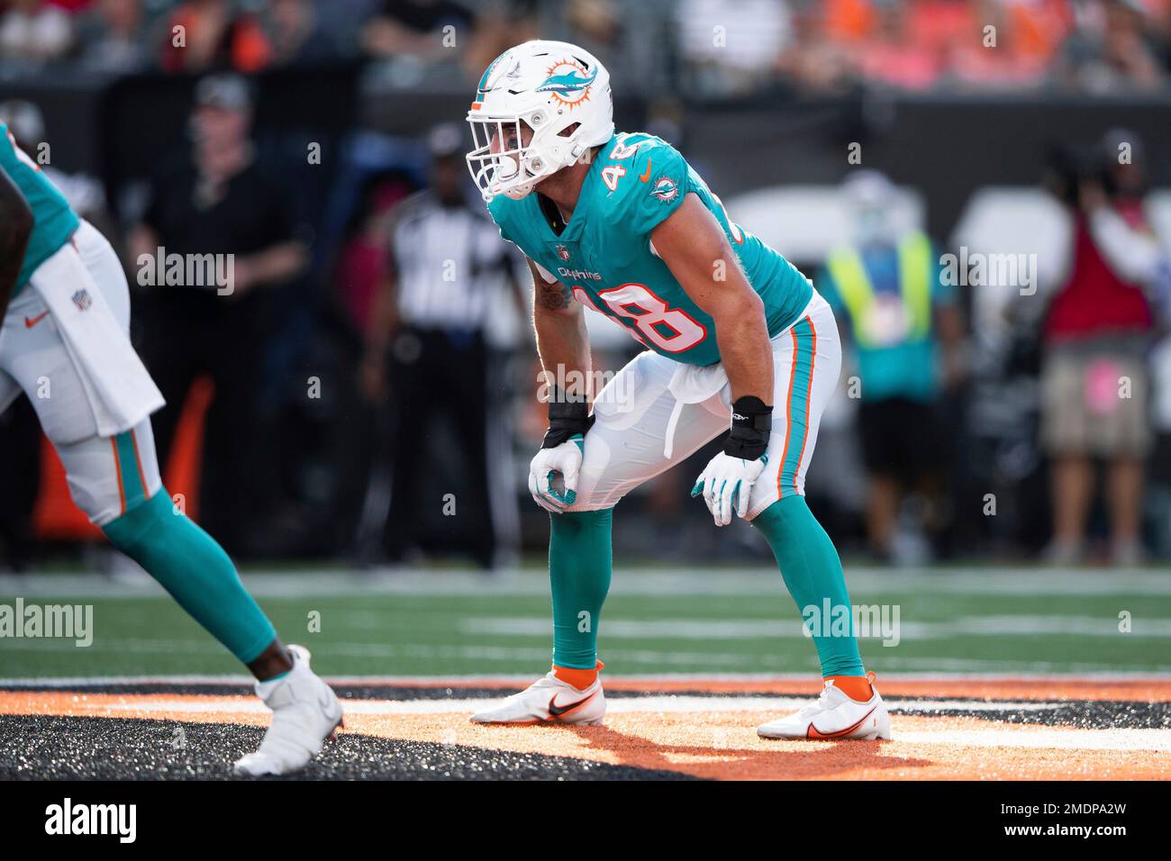 Miami Dolphins linebacker Calvin Munson (50) defends during an NFL football  game against the Miami Dolphins, Saturday, Aug. 13, 2022 in Tampa, Fla. The  Dolphins defeat the Buccaneers 26-24. (AP Photo/Peter Joneleit